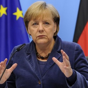Меркель заявила, что Германия не справляется с потоком беженцев
